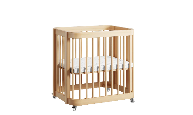 Mobile and convertible Nestig Wave Crib